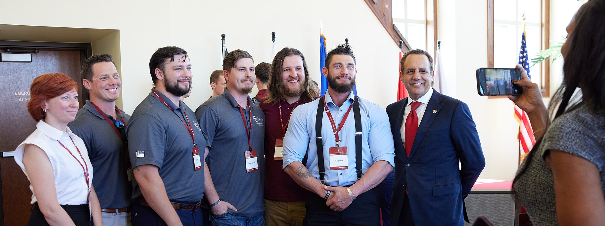 Attendees of the 2024 MVC Reception pose with OU President Joe Harroz after the event.