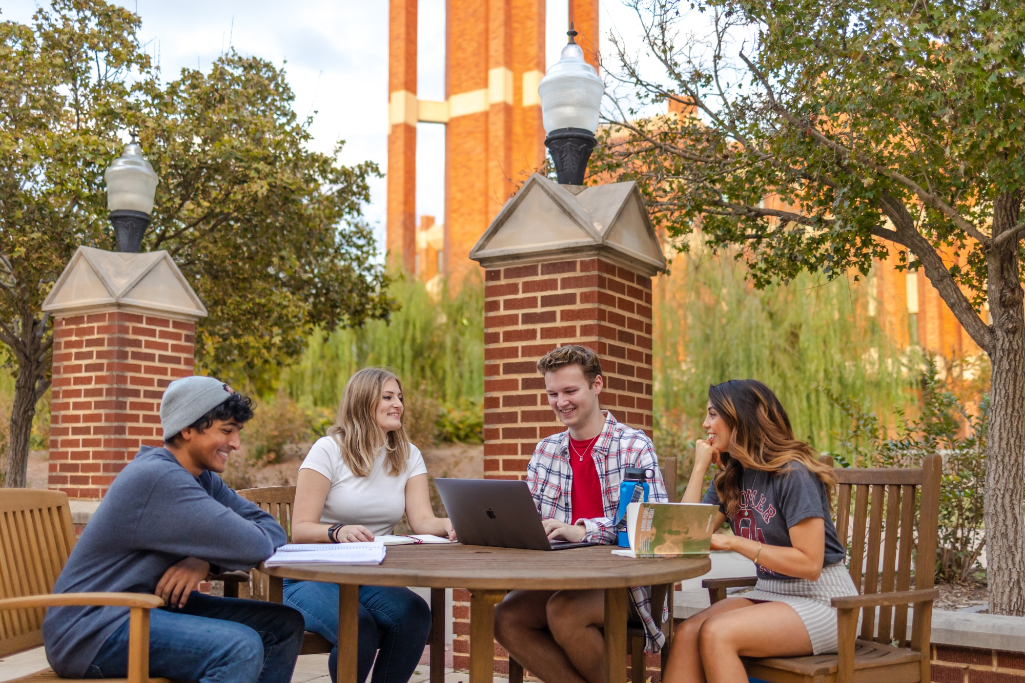 Four students sitting at a table