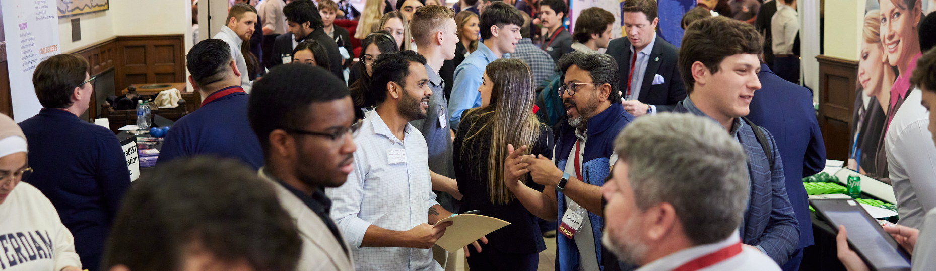 Students and employers interact during a career fair.