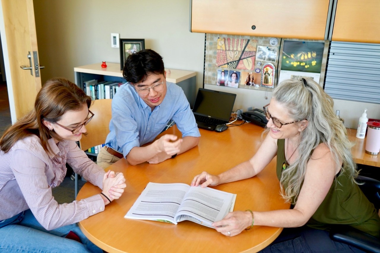 Lori L. Jervis, Professor of Anthropology and a Co-Director of the Center for Applied Social Research, guides students with their problems