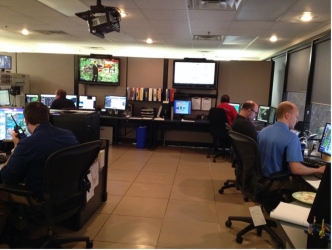 Dr. Friedman (second from right) taking fieldnotes in an NWS WFO during a severe weather event.