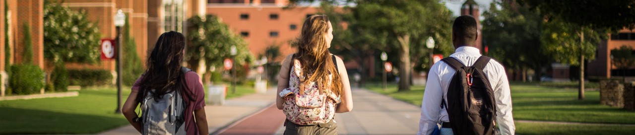 Three students walking on the University of Oklahoma campus