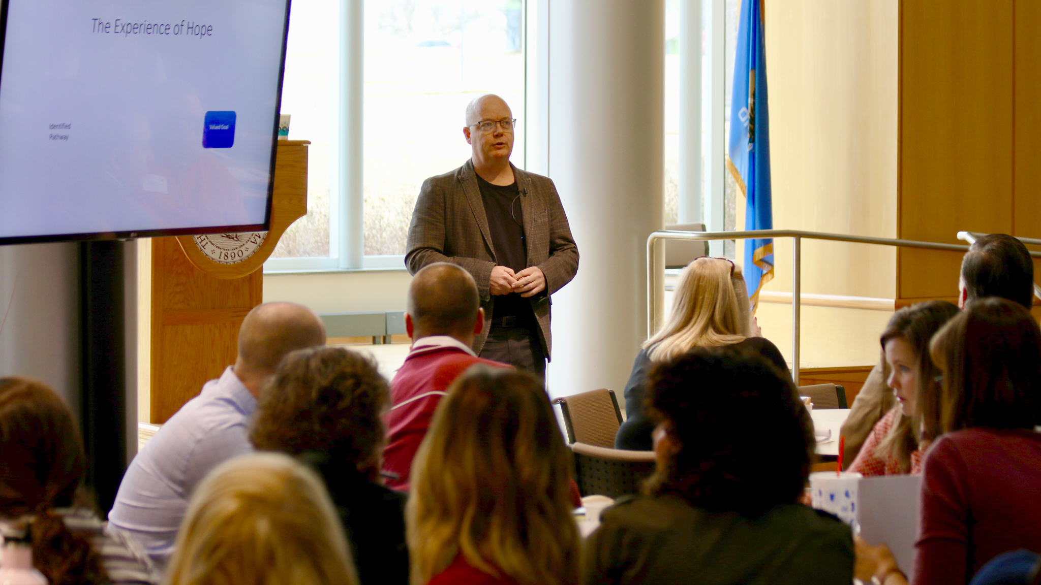 Professor Chan Hellman giving presentation in the learning center