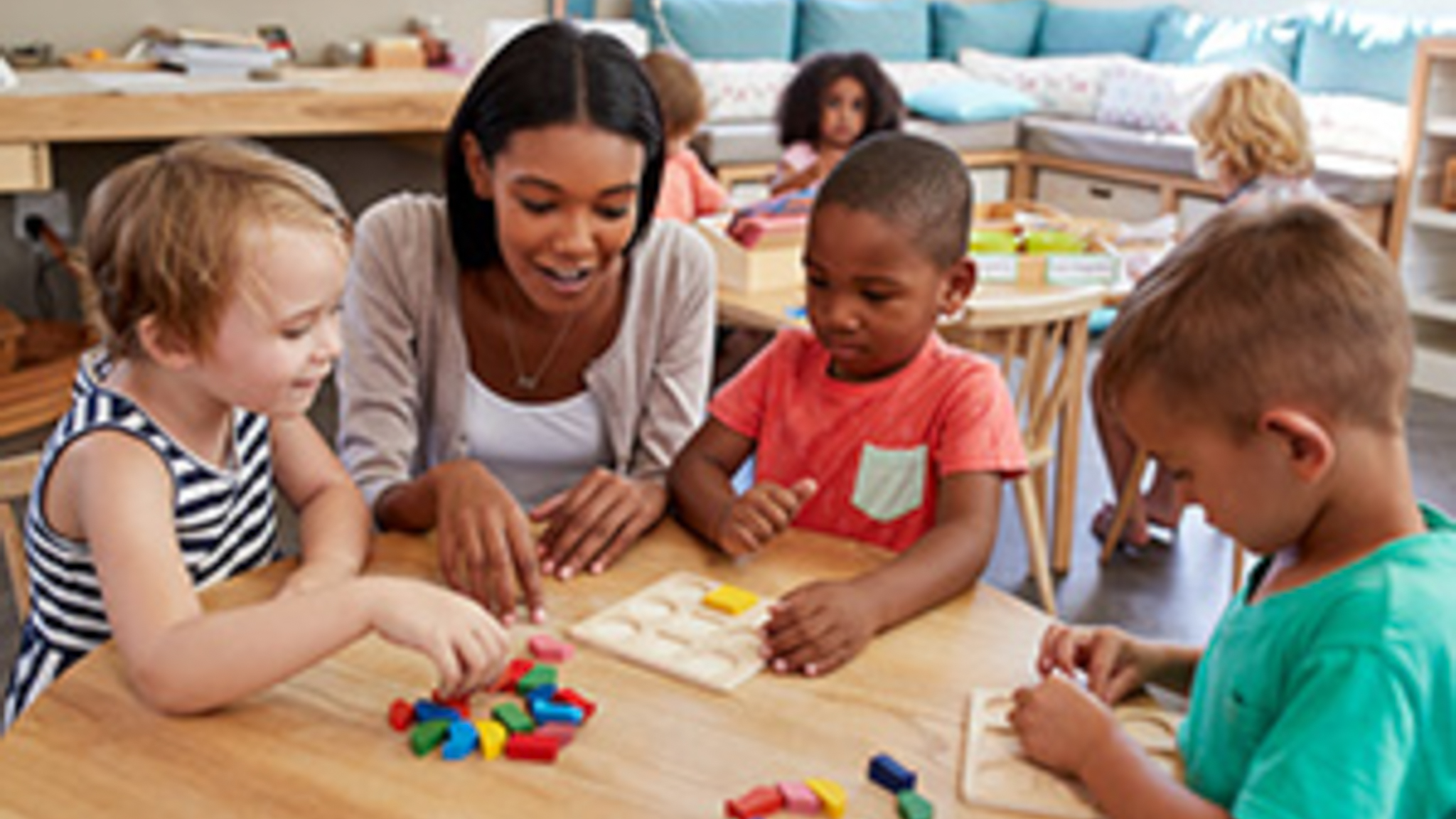 Student interacting with children