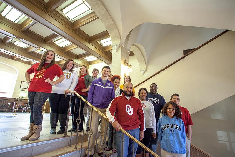 students in OMU standing on stairs