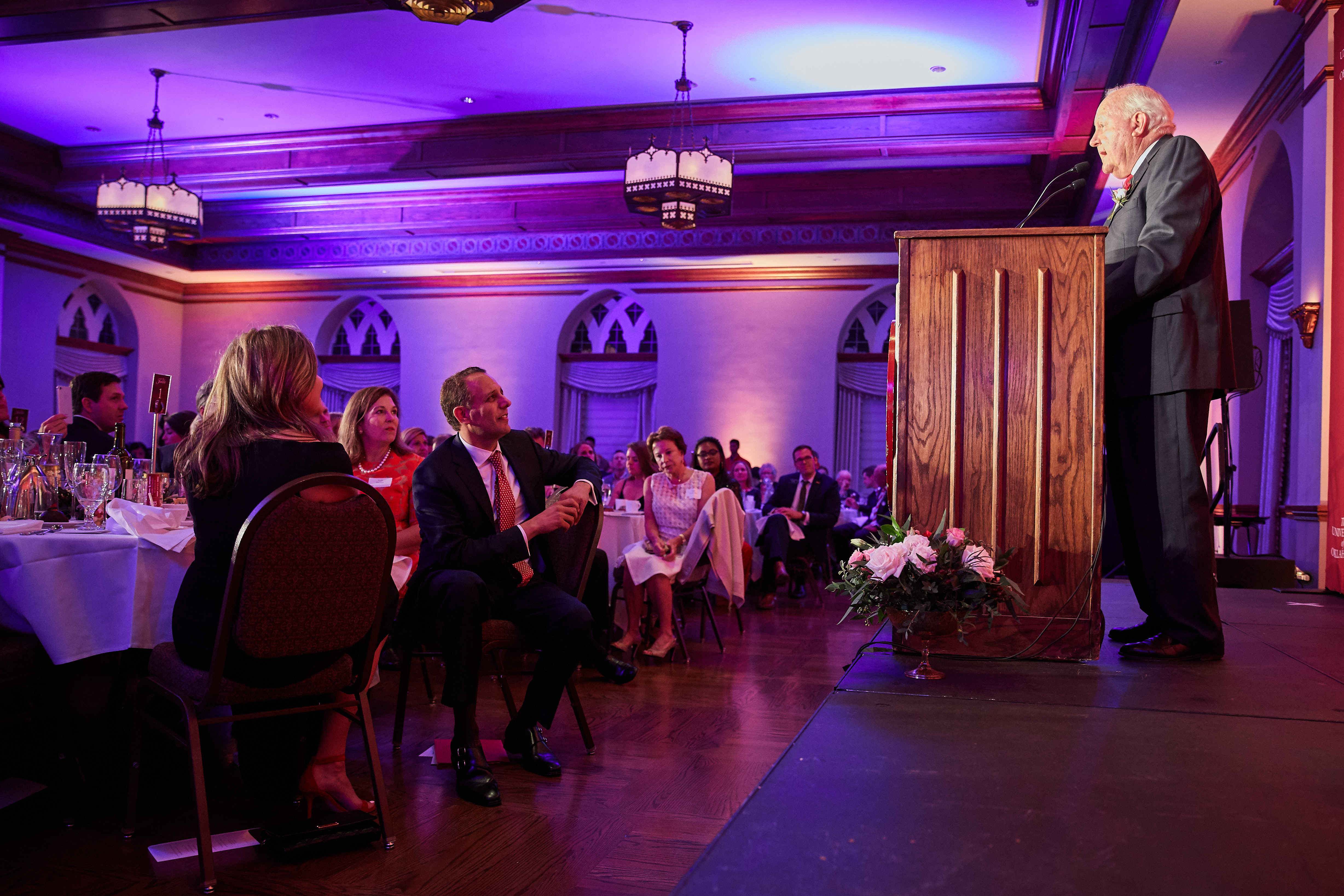 Mr. Mewbourne giving a speech at a Mewbourne College event.