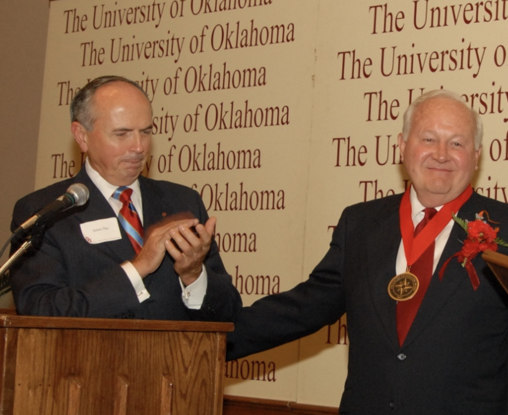 Mr. Mewbourne and James C. Day posing together at a Mewbourne College Event.