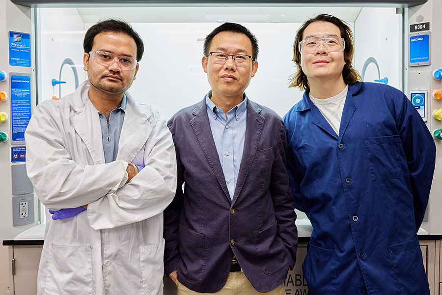 Saroj Karki, Hanping Ding, and Shuanglin Zheng together in their laboratory.