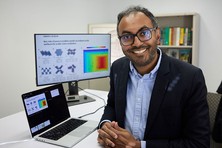 Kasun Gunasooriya in front of the computational work he providing to the study.