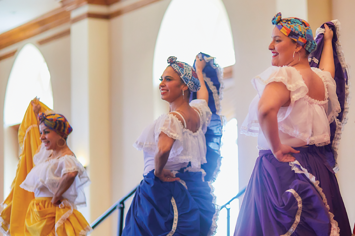 Dancers on stage during 2023 Latino Flavor event