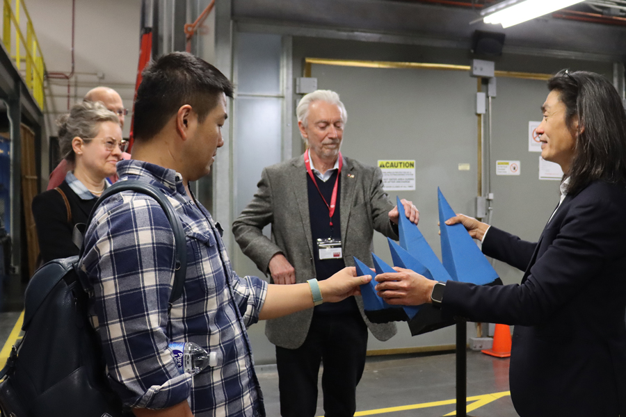 Workshop attendees learning about the materials used in the anechoic chamber in the Radar Innovations Laboratory.