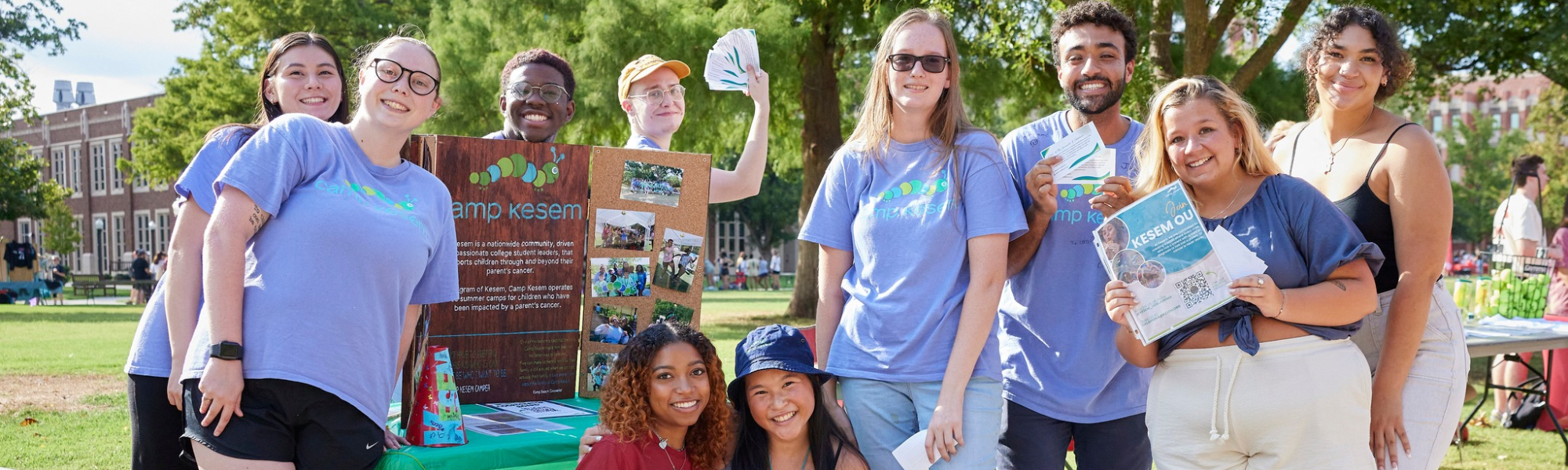 Students advertising their student organization at an involvement fair.