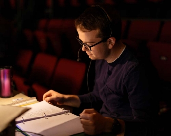 students laying out stage marks for an upcoming production