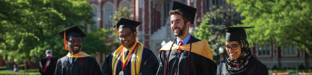 picture of four graduates