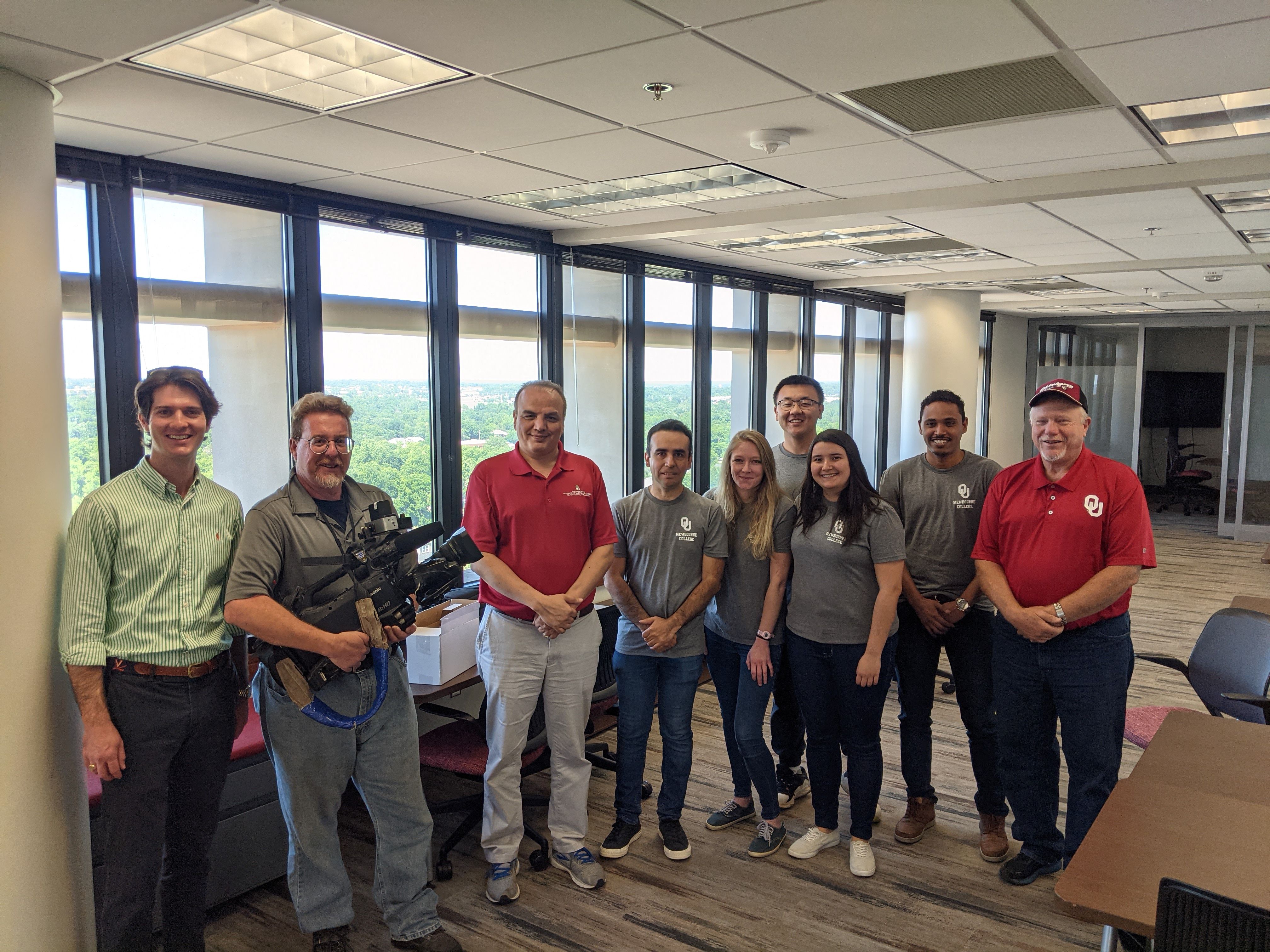 Photo-Geothermal-team-with-Fox-News-Group-Fox25-Tom-Ferguson-Cameraman-Unnamed-Dr-Saeed-Salehi-Students-Cesar-Vivas-Munar-Alex-Cedola-Yuxing-Wu-Camila Castillo-Abdelmjeed-Mohamed-Research-Equipment-Specialist-Jeff-McCaskill.