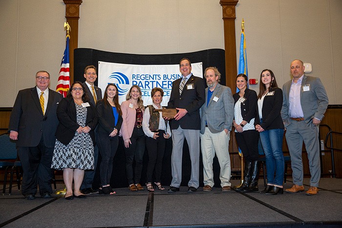 various representatives of Price College, Love’s, Oklahoma Lt. Gov. Matt Pinnell, and Oklahoma State Regents for Higher Education Chancellor Glen Johnson