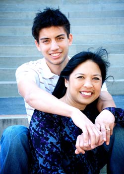 Son Embracing Mother On Steps