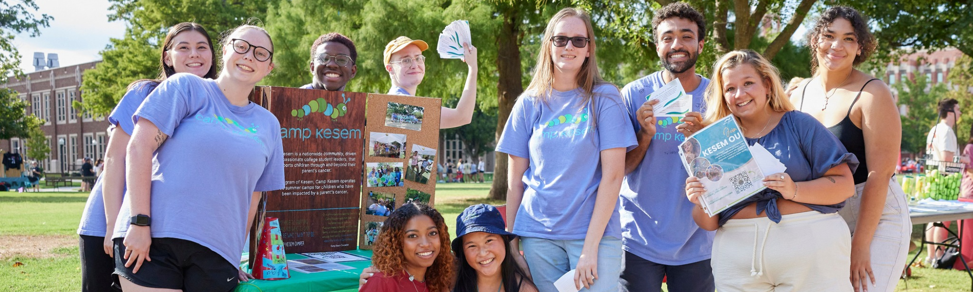 Students promoting their student organization at an involvement fair.