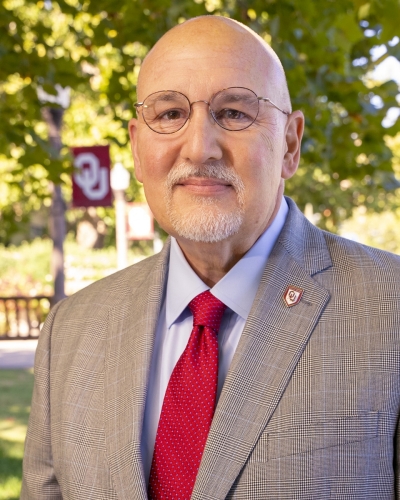 Interim President James J. Sluss